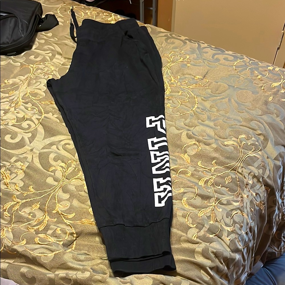 Black Joggers with White Lettering